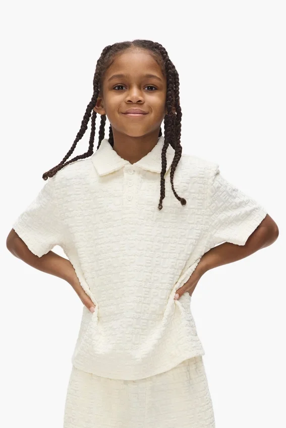 Polo en tissu éponge à motif Wordmark répété pour enfants