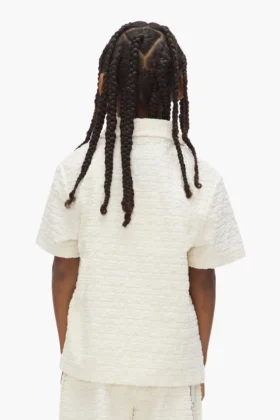 Polo en tissu éponge à motif Wordmark répété pour enfants