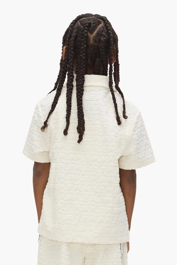 Polo en tissu éponge à motif Wordmark répété pour enfants