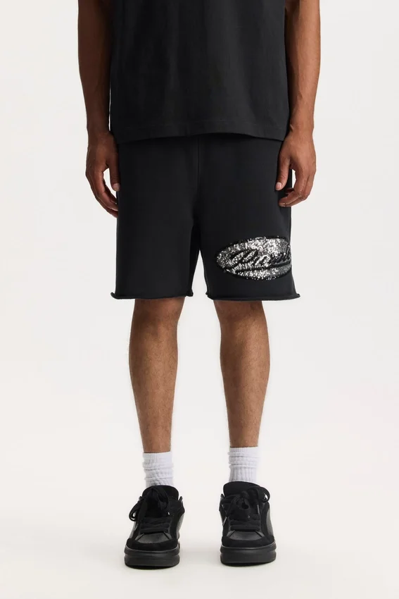 Shorts à inscription en paillettes