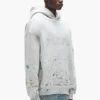 Sweat à capuche camouflage clouté