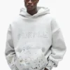 Sweat à capuche camouflage clouté